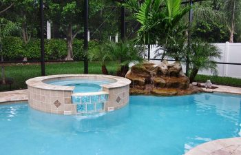 spa pools with a hardscape waterfall