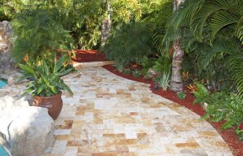 Interlocking brick paver pool deck