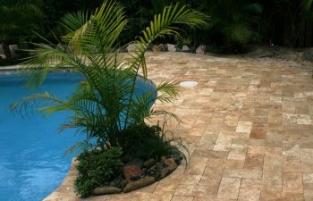 Interlocking brick paver pool deck