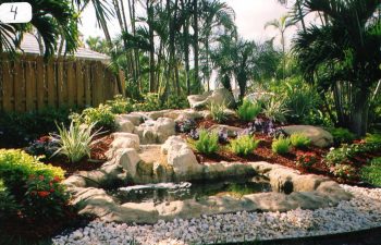 hardscape waterfall in a landscaped garden