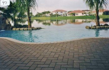 backyard in-ground swimming pool overlooking the bay