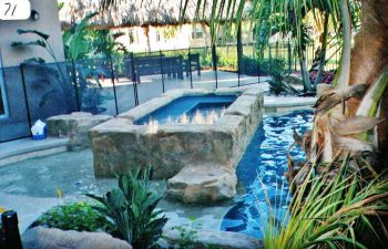 outdoor swimming pool and stone jacuzzi