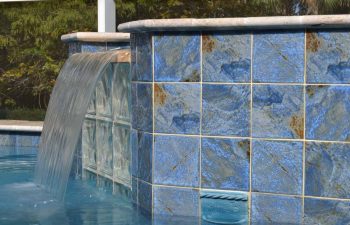 outdoor spa pools with a waterfall