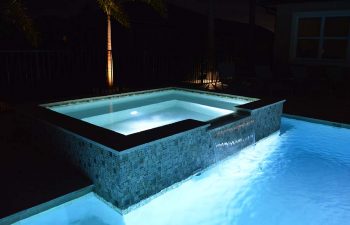 night view of outdoor spa pools with lighting