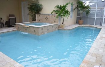 indoor spa pools with waterfalls and decorative tiles