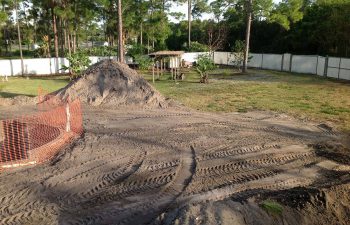 backyard swimming pool under construction