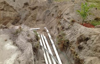 backyard swimming pool under construction- pipe system