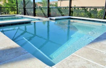 glass enclosed pools with light blue water color