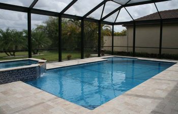 glass enclosed swimming pool and jacuzzi