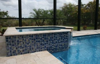 backyard indoor jacuzzi with artistic tiles