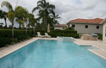 backyard swimming pool with light blue water color