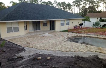 backyard swimming pool under construction