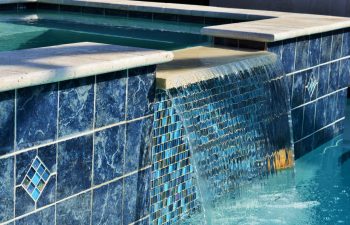 outdoor spa pools with a waterfall