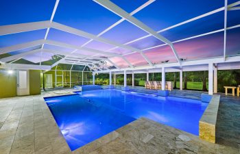 Swimming pool under an openwork steel structure